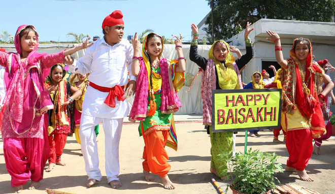 Students of Guru Amar Dass Public School perform bhangra to celebrate Baisakhi in Jalandhar
