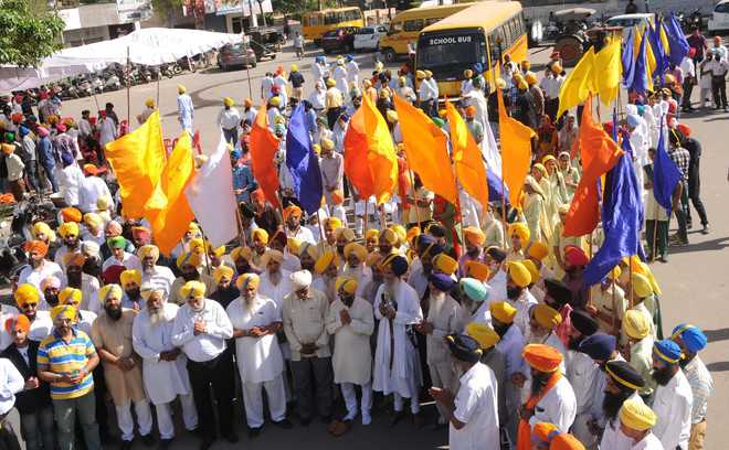 Volunteers of Akal Purakh Ki Fauj take out a rally on the occasion of Baisakhi in Amritsar