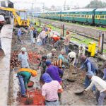 Workers engaged in civil works at platform number 5 at the railway station in Amritsar