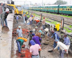 Workers engaged in civil works at platform number 5 at the railway station in Amritsar
