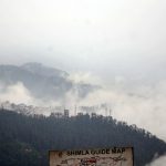 Fog covers Shimla’s mountains on June 15, 2016