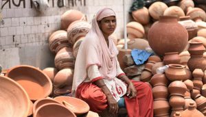 Forty-year-old Tarawati sells earthenware made by her husband at New Friends Colony.On a day that cherishes and honours motherhood, let us spare a thought for the women who have striven against all odds to protect and nurture their families. This photo feature takes us into the lives of some of these courageous mothers who have made a life of dignity for themselves and their children on the unforgiving streets of Delhi.