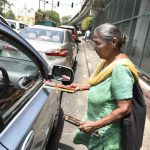 Harjit Kaur, 85, has been selling incense sticks at the traffic signal near Chiragh Delhi flyover for over two decades. A mother of four, her children have all passed away. One of her sons, who sold incense sticks along with her, died after being hit by a truck - a danger she too deals with every day.