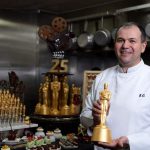 Pastry chef Kamel Guechida poses in the kitchen while preparing the diner for the 91st annual Academy Awards Governors Ball, in Hollywood, California, on February 20, 2019