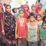 Poor Women with their children the Indira Colony slum in Jalandhar