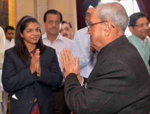 President Pranab Mukherjee is greeted by bronze medal winner wrestler Sakshi Malik at the National Sports and Adventure Award 2016 function at Rashtrapati Bhawan in New Delhi on August 29, 2016.