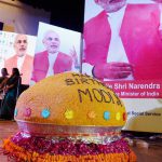 Railway Minister Suresh Parbhu (not pictured) unveiled a large laddu bearing birthday wishes for Prime Minister Narendra Modi at the inauguration of Swacchata Diwas function at Mavlankar Hall in New Delhi on September 17, 2016.