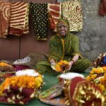 Ratan Devi sells items of worship near Kalkaji Temple. Widowed 25 years ago, she raised her five children on the earnings of her makeshift stall which she sets up early morning. Although she lives close to her grown up children, she does not feel their love for her as a mother.