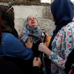 The mother of 16-year-old Palestinian teenager Mohammed Abu Khudair, who was killed in Jerusalem, cries after a court sentenced one of her son's murderers, Yosef Ben-David, (not pictured) to life in prison, at Jerusalem's District Court May 3, 2016