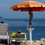 A dog is seen at dog beach and bar in Crikvenica, Croatia, on July 12, 2016.