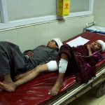 In this photograph taken on May 10, Afghan children wounded in a car bomb attack are treated at a hospital in the Nazyan district of Nangarhar province.