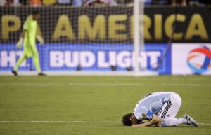 Argentina's Lionel Messi reacts after losing 4-2 to Chile in penalty kicks during the Copa America Centenario, in East Rutherford, N.J.