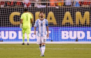 Argentina midfielder Lionel Messi (10) reacts after missing a shot during the shootout round against Chile in the final of the 2016 Copa America Centenario at MetLife Stadium.