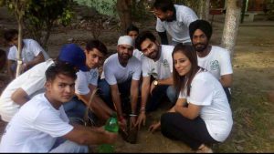Citizen activists plant a sapling to celebrate the World Environment Day in Amritsar