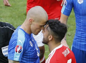 Slovakia's Martin Skrtel clashes with Wales' Neil Taylor at a match between Wales and Slovakia at the Euro 2016-Group B at Stade de Bordeaux, Bordeaux, France on June 11, 2016.