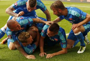 Slovakia’s Ondrej Duda celebrates after scoring their first goal with teammates at a match between Wales and Slovakia at the Euro 2016-Group B at Stade de Bordeaux, Bordeaux, France on June 11, 2016.