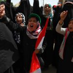 Yemeni children attend a rally protesting the recent deployment of US Special Forces to Yemen, amid the ongoing conflict in the impoverished Arab state, outside the UN offices on May 12, in the capital Sanaa.