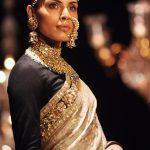 A model showcases a creation by designer Sabyasachi at Lakme Fashion Week (LFW) Winter/Festive 2016 in Mumbai on late August 28, 2016.