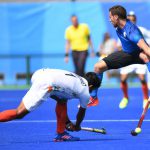 Argentina’s Lucas Vila jumps as India’s Harmanpreet Singh hits the ball during the mens field hockey Argentina vs India match of the Rio 2016 Olympics Games at the Olympic Hockey Centre in Rio de Janeiro on August 9 2016.