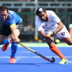 Argentina’s Pedro Ibarra (L) and India’s Akashdeep Singh stretche for the ball during the mens field hockey Argentina vs India match of the Rio 2016 Olympics Games at the Olympic Hockey Centre in Rio de Janeiro on August 9, 2016.