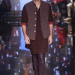 Bollywood actor Ranbir Kapoor displays creations by Kunal Rawal during the Lakme Fashion Week (LFW) Winter/Festive 2016 in Mumbai on August 27, 2016.