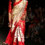 Bollywood actress Bipasha Basu showcases a creation by designer Sanjukta Dutta during the Lakme Fashion Week (LFW) Winter/Festive 2016 in Mumbai on August 28, 2016.
