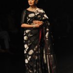 Bollywood actress Dia Mirza showcases a creation by designer Santosh Parekh during the Lakme Fashion Week (LFW) Winter/Festive 2016 in Mumbai on August 28, 2016.