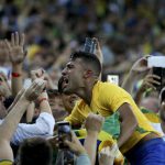 Brazil’s Rafinha celebrates his team’s win over Germany in their gold medal men’s football match at the Maracana stadium in Rio de Janeiro on August 20, 2016