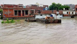 Houses stand partially in Uttar Padesh’s Allahabad on August 23, 2016