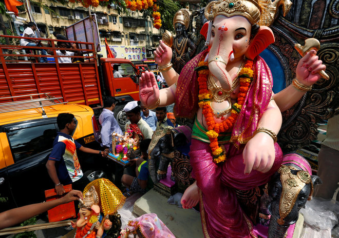 Idols of the Hindu god Ganesh, the deity of prosperity, are transported to places of worship on the first day of the Ganesh Chaturthi festival in Mumbai, on September 5, 2016.