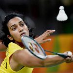 India’s PV Sindhu returns against China’s Wang Yihan during their women’s singles quarterfinal badminton match at the Riocentro stadium in Rio de Janeiro on August 16, 2016, at the Rio 2016 Olympic Games. Sindhu won the match 22-20, 20-19.