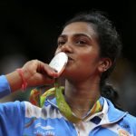 India’s Pusarla V Sindhu poses kissing her silver medal at the Riocentro stadium in Rio de Janeiro on August 19, 2016