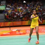 India’s Pusarla V. Sindhu returns against Spains Carolina Marin during their womens singles Gold Medal badminton match at the Riocentro stadium in Rio de Janeiro on August 19, 2016, for the Rio 2016 Olympic Games.