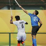 India’s Surender Kumar (L) competes with Argentina’s Manuel Brunet during the men’s field hockey Argentina vs India match of the Rio 2016 Olympics Games at the Olympic Hockey Centre in Rio de Janeiro on August 9, 2016.
