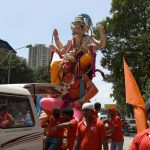 Indian Hindu devotees transport an idol of the elephant-headed Hindu god, Lord Ganesha for Ganesh Chaturthi in Mumbai on September 5, 2016.