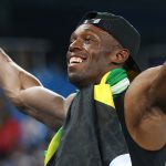 Jamaica’s Usain Bolt celebrates his team’s victory at the end of the Mens 4x100m Relay Final during the athletics event at the Rio 2016 Olympic Games at the Olympic Stadium in Rio de Janeiro on August 19, 2016