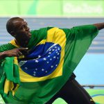 Jamaica’s Usain Bolt celebrates his team’s victory at the end of the Mens 4x100m Relay Final during the athletics event at the Rio 2016 Olympic Games at the Olympic Stadium in Rio de Janeiro