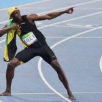 Jamica's Usain Bolt strikes his signature pose after winning the gold in Men's 100m in the 2016 Rio Olympics at Rio de Janeiro in Brazil