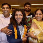 Rio Olympics bronze medalist Sakshi Malik being greeted by her parents as she arrives at IGI airport T3 in New Delhi from Rio de Janeiro