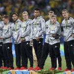 Team Germany react during the medal ceremony after losing to Brazil in Rio 2016 Olympic Games men’s football gold medal match between Brazil and Germany at the Maracana stadium in Rio de Janeiro on August 20, 2016