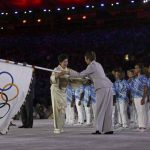 Tokyo governor Yuriko Koike takes the Olympic flag on stage during the closing ceremony of the Rio 2016 Olympic Games at the Maracana stadium in Rio de Janeiro on August 21, 2016