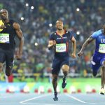 Usain Bolt of Jamaica (L) wins the gold. Justin Gatlin of USA (R) took the silver.