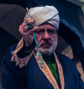 A Kashmiri cleric displays a relic believed to be a hair from the beard of Prophet Mohammad during Eid-e-Milad, the birth anniversary of the Prophet, at the Hazratbal Shrine in Srinagar on December 12, 2016.