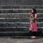 A Nepalese Hindu woman brushes her teeth before taking a ritual bath in the Bagmati River during the Rishi Panchami festival in Kathmandu on September 6.