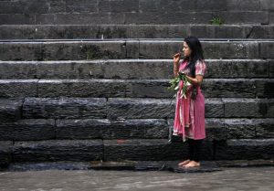A Nepalese Hindu woman brushes her teeth before taking a ritual bath in the Bagmati River during the Rishi Panchami festival in Kathmandu on September 6.