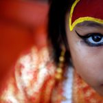 A young girl dressed as the living goddess Kumari takes part in the Kumari Puja festival in Kathmandu, Nepal.