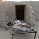 Elderly villager, Teeja Kaur, takes a rest on a bed at the border village Dauke, about 40 kms from Amritsar on September 29, after the Punjab government issued a warning to villagers to evacuate from a 10 km radius from the India-Pakistan border.