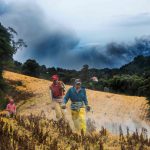 Farmers work nearby the Turrialba volcano in Cartago, 46 Km east of San Jose, Costa Rica.