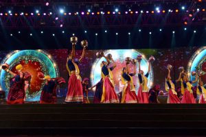 Indian folk dancers perform during the full dress rehearsal on the eve of Vibrant Navratri Mahotsav at the GMDC ground, late September 30, 2016.