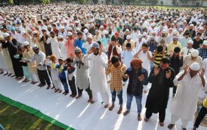 Muslims pray during the Eid al-Adha festival at a mosque at the Eid Gah (prayer) ground in Jammu